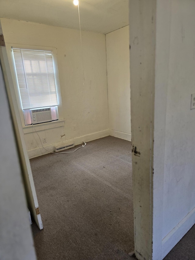 empty room featuring carpet and cooling unit