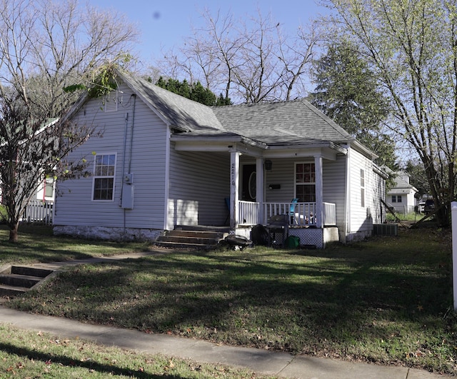 bungalow with a front lawn and a porch