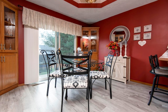 dining room featuring light hardwood / wood-style floors