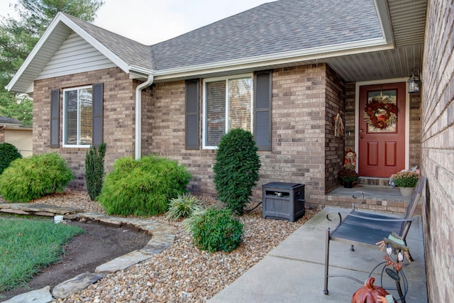 property entrance featuring a patio area