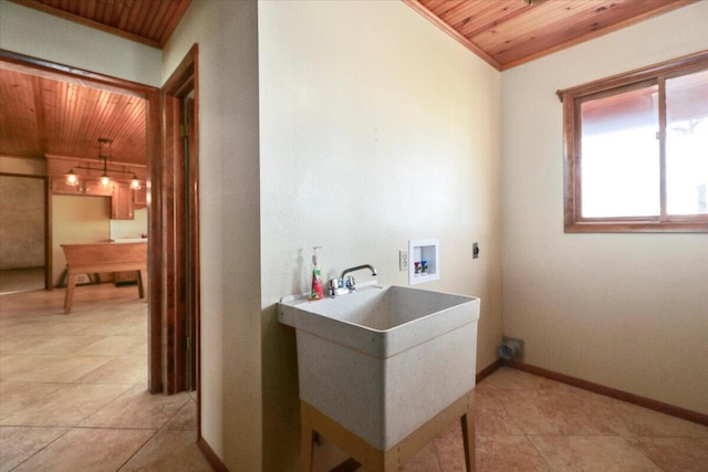 2112 Cambridge Dr, West Plains, MO 65775 - laundry area featuring wooden ceiling, light tile patterned floors, hookup for a washing machine, and baseboards