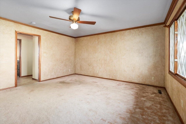 2112 Cambridge Dr, West Plains, MO 65775 - spare room with carpet floors, ceiling fan, crown molding, and baseboards