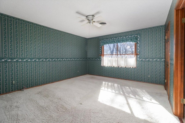 2112 Cambridge Dr, West Plains, MO 65775 - carpeted empty room with a ceiling fan and wallpapered walls