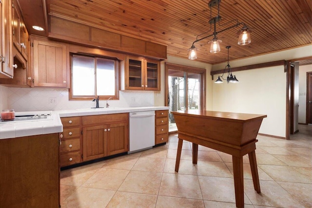2112 Cambridge Dr, West Plains, MO 65775 - kitchen with white dishwasher, tile countertops, stovetop, tasteful backsplash, and wooden ceiling