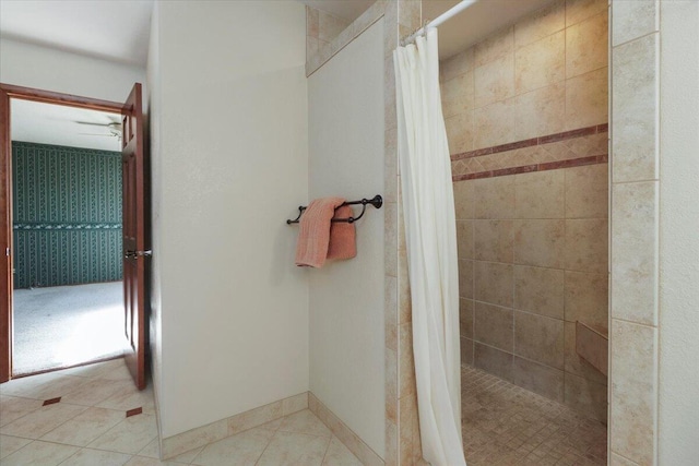 2112 Cambridge Dr, West Plains, MO 65775 - full bath featuring a stall shower, tile patterned floors, and a ceiling fan