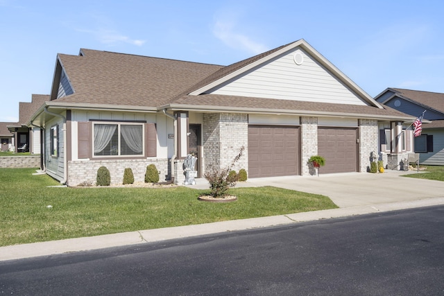 view of front facade with a front lawn and a garage