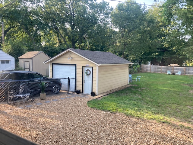 garage featuring a yard