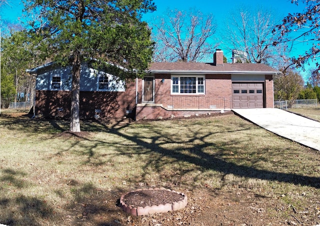 ranch-style house with a garage and a front lawn