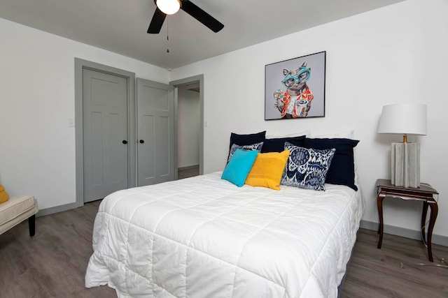 bedroom featuring ceiling fan and hardwood / wood-style flooring