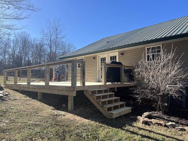 back of property with a deck