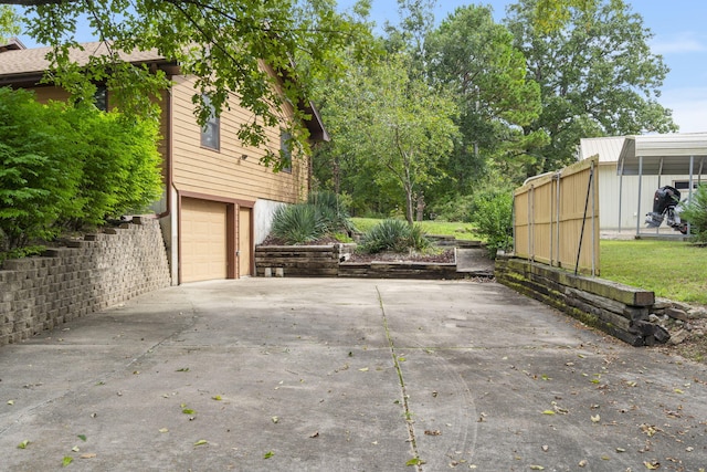 view of side of property featuring a garage