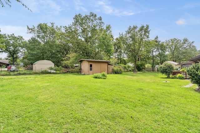 view of yard with a storage unit