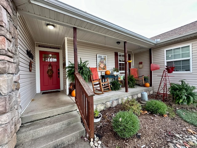 doorway to property with a porch