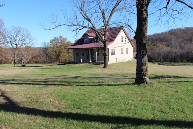 exterior space with a front lawn