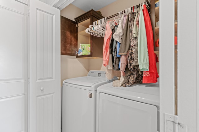 laundry room with washing machine and dryer