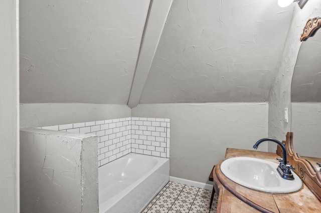 bathroom with a bathtub and vanity