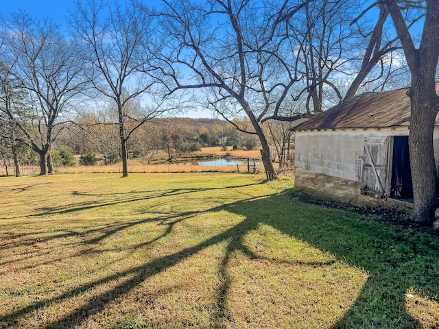 view of yard with a water view