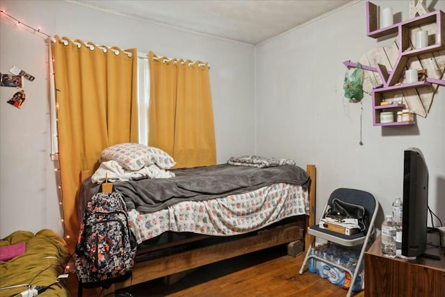 bedroom featuring hardwood / wood-style flooring