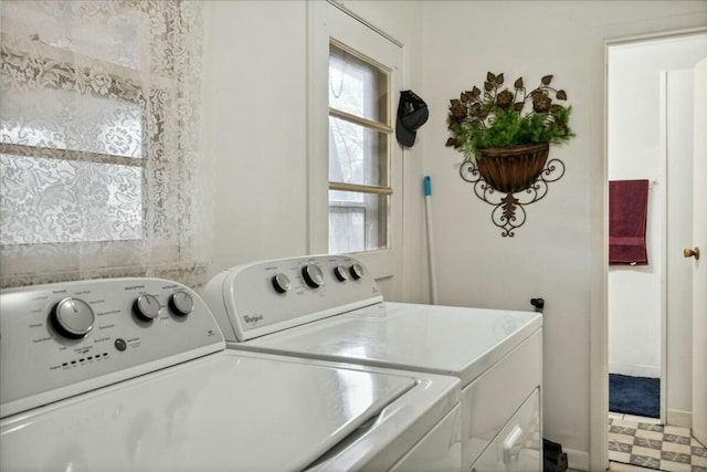 laundry room with separate washer and dryer