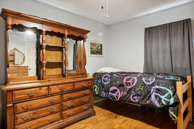 bedroom with light wood-type flooring