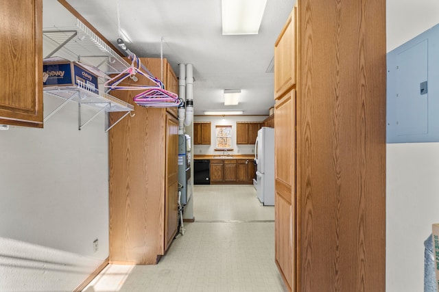 interior space featuring electric panel and sink