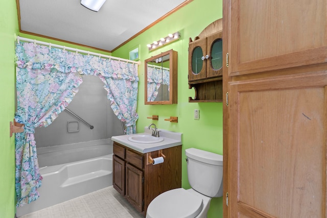 bathroom with vanity, toilet, and crown molding