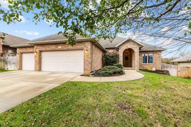 ranch-style home with a front lawn and a garage