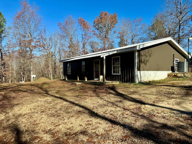 back of house with cooling unit