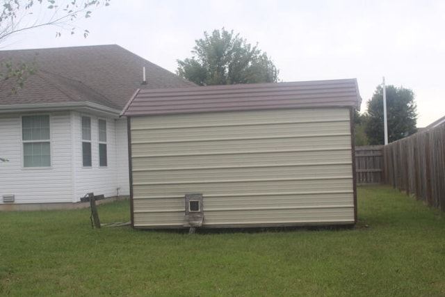 view of property exterior with a yard