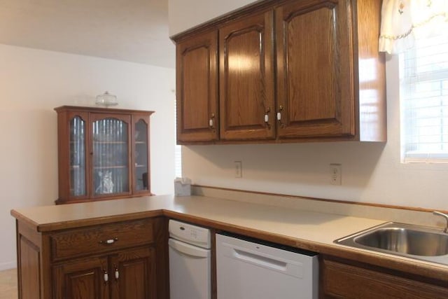 kitchen with dishwasher and sink