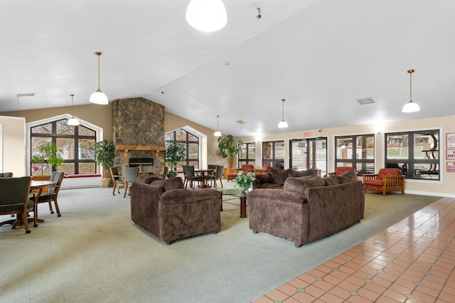 living room with carpet flooring, a fireplace, and vaulted ceiling