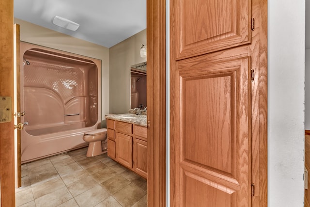 full bathroom with tile patterned floors, shower / bathing tub combination, vanity, and toilet