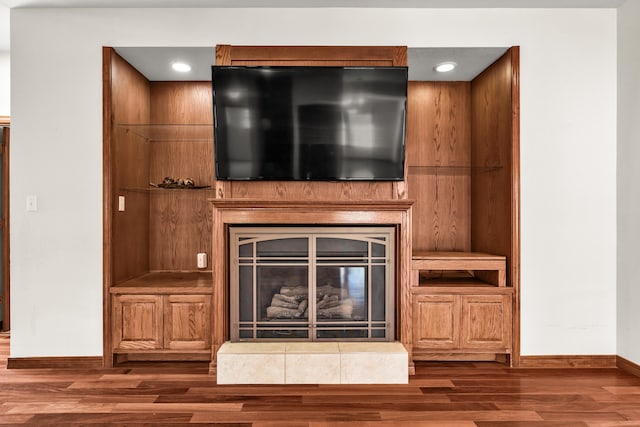 interior details with hardwood / wood-style flooring