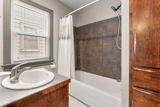 bathroom featuring sink and shower / tub combo with curtain