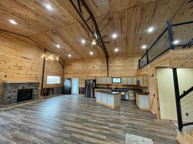 kitchen with refrigerator with ice dispenser, high vaulted ceiling, and dark wood-type flooring