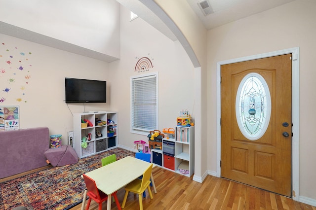 entrance foyer featuring wood-type flooring