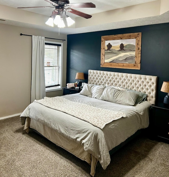 bedroom featuring carpet flooring and ceiling fan