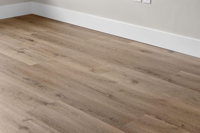 interior details featuring wood finished floors