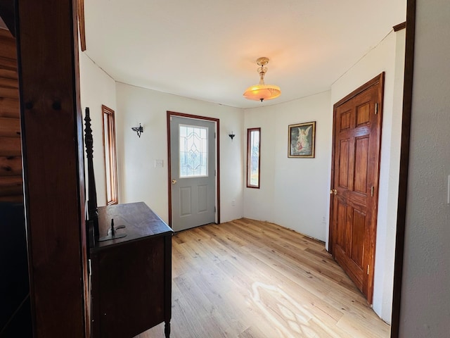 foyer with light wood-type flooring