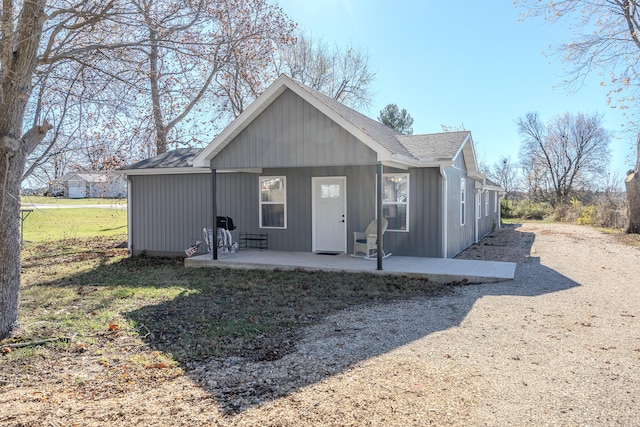 back of property with a patio area