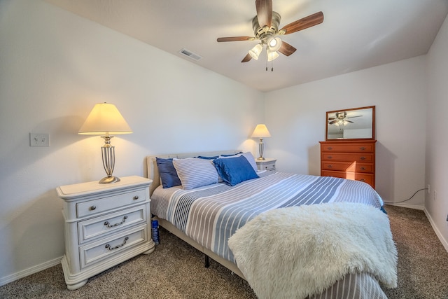 bedroom with dark carpet and ceiling fan