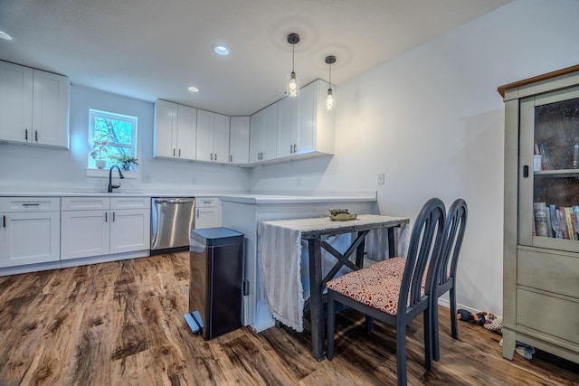 538 W Mack Rd, Seymour, MO 65746 - kitchen with dishwasher, a sink, dark wood-style flooring, white cabinets, and recessed lighting