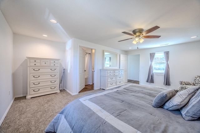 bedroom featuring ceiling fan and light colored carpet