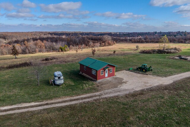 birds eye view of property featuring a rural view