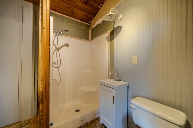 bathroom with toilet, a shower, wood ceiling, and vanity