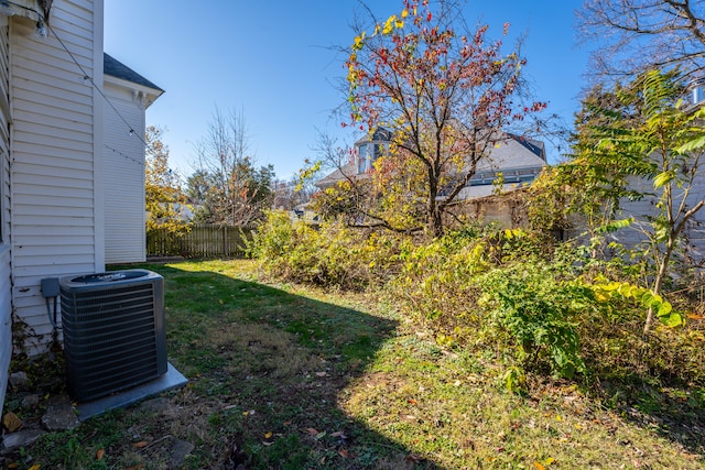 view of yard with central air condition unit