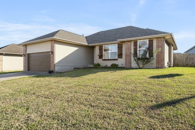 single story home featuring a garage and a front lawn