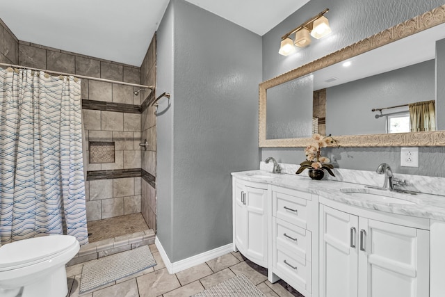 bathroom with tile patterned flooring, toilet, vanity, and a shower with shower curtain