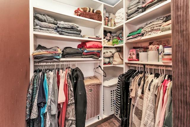 walk in closet featuring hardwood / wood-style floors