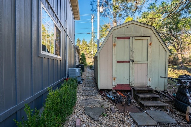 view of outbuilding featuring central AC unit